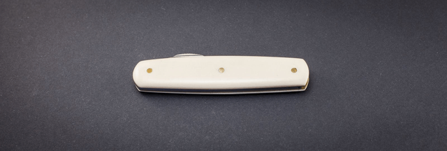 Onglet nogentais, manche elforyn imitation ivoire, lame inox