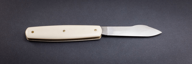Onglet nogentais, manche elforyn imitation ivoire, lame inox